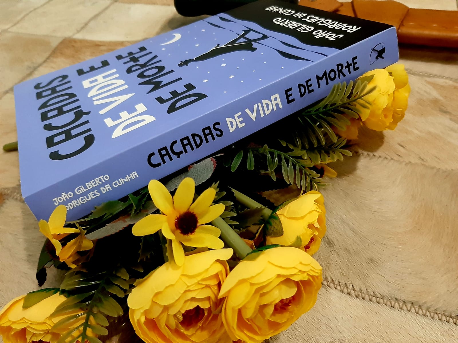 Lombada do livro Caçadas de Vida e de morte